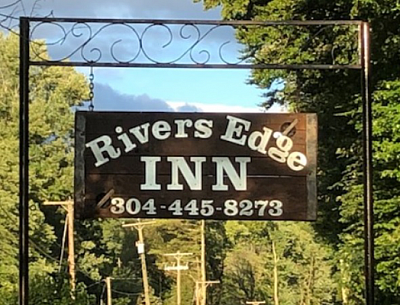 Rivers Edge Inn - Hinton | Hotels & Travel | Logo