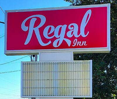 Regal Inn - Brent | Hotels & Travel | Logo